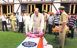 J&K Home Minister Nasir Aslam Wani pays tribute to slain constable Dalbir Singh in Pulwama. 