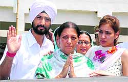 BJPs Sukhjit Kaur Sahi with her son and daughter greets her supporters