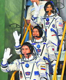Indian-American astronaut Sunita Williams (top) with crew of the mission to the International Space Station before the launch of the Soyuz-FG rocket at Baikonur Cosmodrome on Sunday.