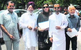 BSP members go to submit a memorandum to UT Administrator Shivraj Patil in Chandigarh on Saturday