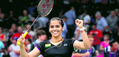 Saina Nehwal plays a shot during a quarterfinal women's singles badminton match against Tine Baun of Denmark on Thursday.