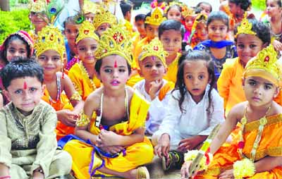 Children from Golden Bells School attired as Lord Krishna participate in Janmashtami celebrations in Mohali on Friday.