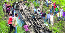 Mangled remains of the bus that rolled down into a gorge near Chamba on Saturday.