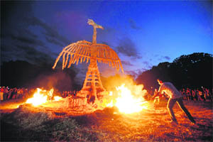 Artists burn a 10 m high straw art installation of a phoenix during the recent 7th Straw — Land Art Festival in Osijek, East Croatia. Twenty artists made 20 art installations using 30 tons of straw.