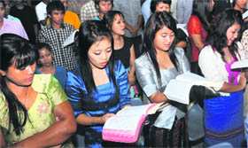 Students from the North East take part in a prayer meeting at Sector 11, Chandigarh, on Sunday.