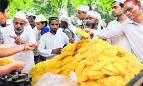Muslims buy 'sawaiya' on the eve of Eid at Jama Masjid, Chandigarh, on Sunday.