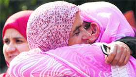 An embrace to extend Eid greetings.