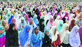 Women attend a congregation to mark the end of Ramadan, the holy month of fasting for Muslims.