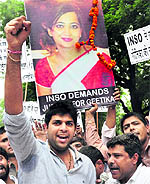 A protest being held against Gopal Kanda in New Delhi
