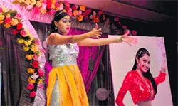 A member of Niharika Ladies Club presents a dance performance during an inter-club competition in Ludhiana. A tribune photograph