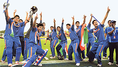 Indian colts exult after defeating Australia in the final of the Under-19 World Cup tournament in Townsville on Sunday. 