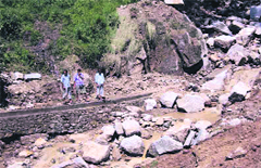 Boulders lie strewn after the landslide that occurred at Pambabe, Darma valley. A Tribune photograph