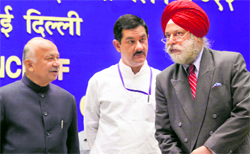 (L-R) Union Home Minister Sushil Kumar Shinde, MoS for Home Jitendra Singh and IB chief Nehchal Sandhu in New Delhi.