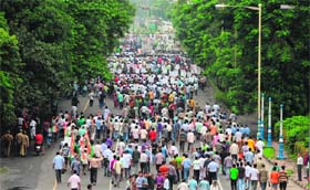 Activists of the Trinamool Congress march during a demonstration against foreign direct investment in multi-brand retail in Kolkata on Saturday