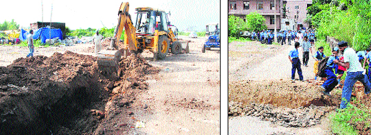 A JCB machine digs up a trench on the Chandigarh-Ambala Highway on the directions of the Punjab and Haryana High Court; and (right) a student jumps over a trench at Dera Bassi on Monday.