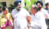 SP chief Mulayam Yadav greets SAD chief Sukhbir Singh Badal and MP Harsimrat Kaur Badal. Tribune photo: Mukesh Aggarwal