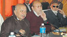 Home Minister Sushil Kumar Shinde (L) in Kargil on Saturday.