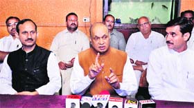 Chief Minister PK Dhumal addresses mediapersons in Una on Tuesday