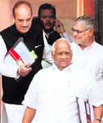 Union Ministers Sharad Pawar, Ghulam Nabi Azad, CP Joshi and Subodh Kant Sahay leave after a Cabinet meeting at South Block in New Delhi on Thursday.