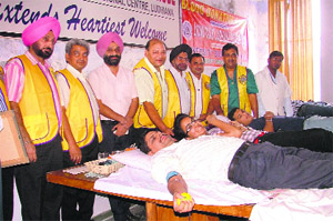 Volunteers donate blood at a camp organised by the Lions Club in collaboration with University Business School in Ludhiana.