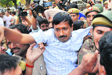 India Against Corruption activist Arvind Kejriwal being detained by the police during a protest against Union Law Minister Salman Khurshid at Janpath, near India Gate in New Delhi on Friday. 