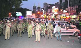 Police personnel take out a flag march at Sarabha Nagar in Ludhiana on Tuesday