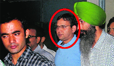 SP (City) Deshraj Singh being taken away by CBI officials from his Sector-23 residence in Chandigarh on Thursday.