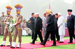 Home Minister Sushil Kumar Shinde, IB chief Nehchal Sandhu and ministers Kapil Sibal and Salman Khurshid arrive to lay a wreath at the Police Memorial on the occasion of Police Commemoration Day in New Delhi on Sunday.
