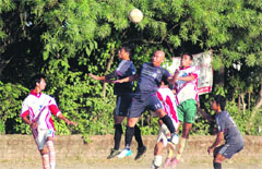 A match in progess in the Shaheed Jaideep Bhandari Memorial Football Tournament being played at Nehru Gram in Dehradun on Monday. 