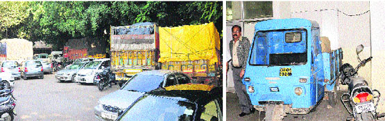 Impounded vehicles parked in the DC office at Sector 17, Chandigarh; and (right) an auto-rickshaw parked inside the building. Tribune photos: Manoj Mahajan
