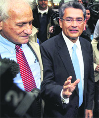 Rajat Gupta and his lawyer outside the federal court in New York. 