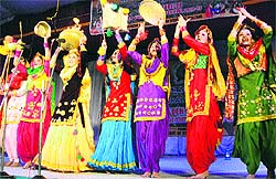 Girls perform in a gidha competition during the youth fest at PAU in Ludhiana on Thursday