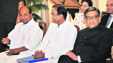External Affairs Minister S M Krishna with Union Minister for Finance P Chidambaram and Defence Minister A K Antony in New Delhi. 