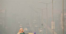 Smog engulfs a street in Ludhiana on Friday morning.