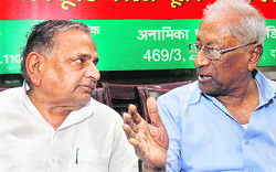 SP chief Mulayam Singh Yadav (L) with CPI leader A B Bardhan in New Delhi on Saturday.