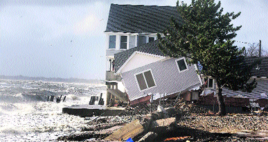 A home ravaged by Hurricane Sandy in Milford, Connecticut on Tuesday. Millions of people across the east coast in the US woke up to scenes of destruction wrought by monster storm.
