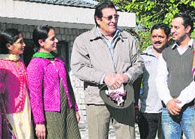 Bollywood actor and former BJP MP from Gurdaspur Vinod Khanna interacts with residents in the Sheila area of Dharamsala on Thursday