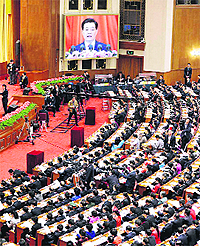 Chinese President Hu Jintao is displayed on a large screen during the opening session of the 18th Communist Party Congress in Beijing on Thursday.