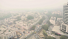 Thick smog envelopes the Connaught Place area in New Delhi.