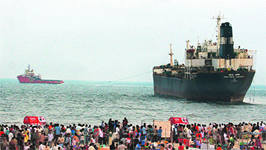 A high-power tugboat successfully pulls the tanker ship Pratibha Cauvery in Chennai on Sunday. 