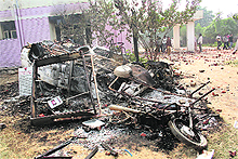 A burnt vehicle at Bhiwanis Bond Kalan police station on Thursday. 