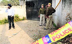 Delhi police personnel outside Ponty Chadhas farmhouse in Chhatarpur, South Delhi, on Saturday