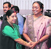 BJP leader Sushma Swaraj with Lok Sabha Speaker Meira Kumar in New Delhi on Wednesday. 