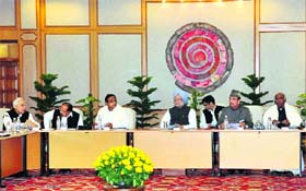 PM Manmohan Singh chairs a meeting of the National Committee on Direct Cash Transfer