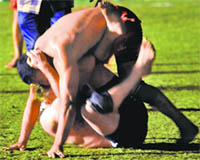 Players from England and Denmark in action during the World Cup kabaddi match in Patiala.