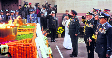 Defence Minister AK Antony, Service chiefs General Bikram Singh, Air Chief Marshal NAK Browne and Admiral DK Joshi pay homage to martyrs at Amar Jawan Jyoti to commemorate Indias victory over Pakistan in the 1971 war, in New Delhi on Sunday.