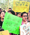 JNU students shout slogans during a protest against the gang rape of a student in New Delhi.