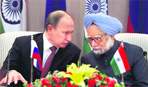 Prime Minister Manmohan Singh with Russian President Vladimir Putin during the joint statement after a meeting at 7RCR in New Delhi on Monday. 