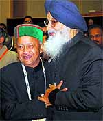 Himachal Pradesh Chief Minister Virbhadra Singh and his Punjab counterpart Parkash Singh Badal greet each other at the NDC meeting in New Delhi on Thursday