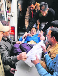 An injured being shifted to Government Medical College in Jammu on Sunday. 